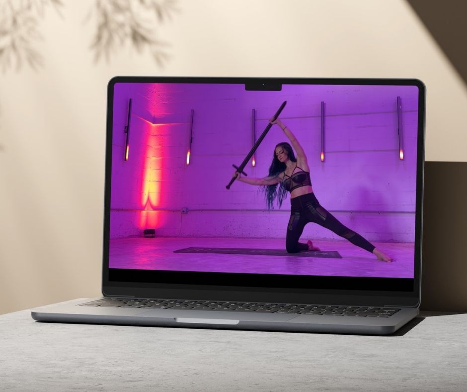 Valkyrie Reborn workouts streaming on a laptop — train at home, on your schedule.